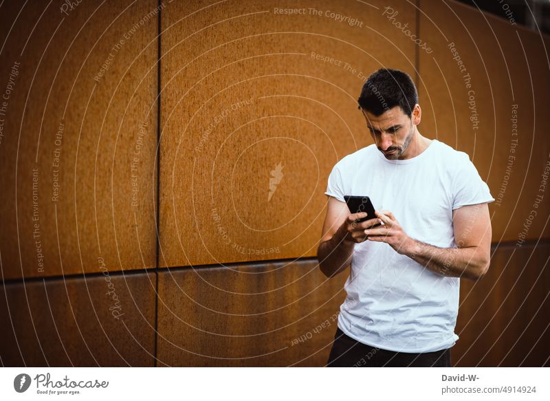 Man uses a smartphone Cellphone Reading hands Typing message Communication SMS Photos of everyday life