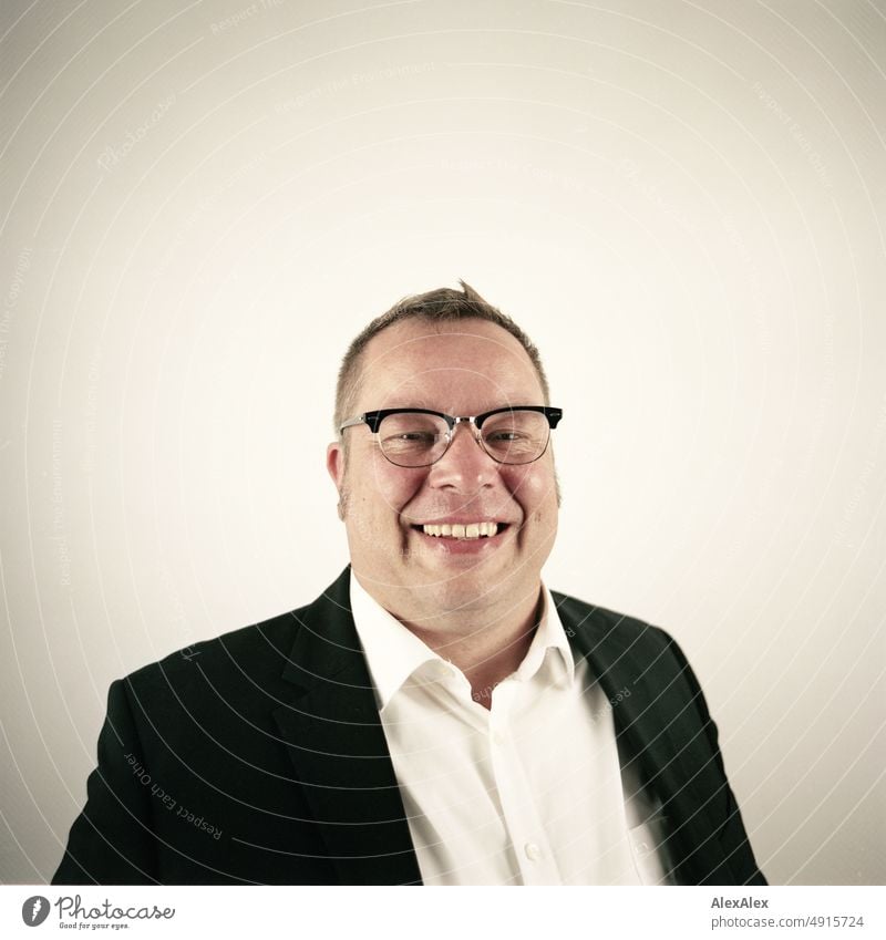 Analog portrait of man in suit with glasses smiling at camera. Profession Lifestyle Economy Office Work and employment Good pretty Upper body 35-50 years