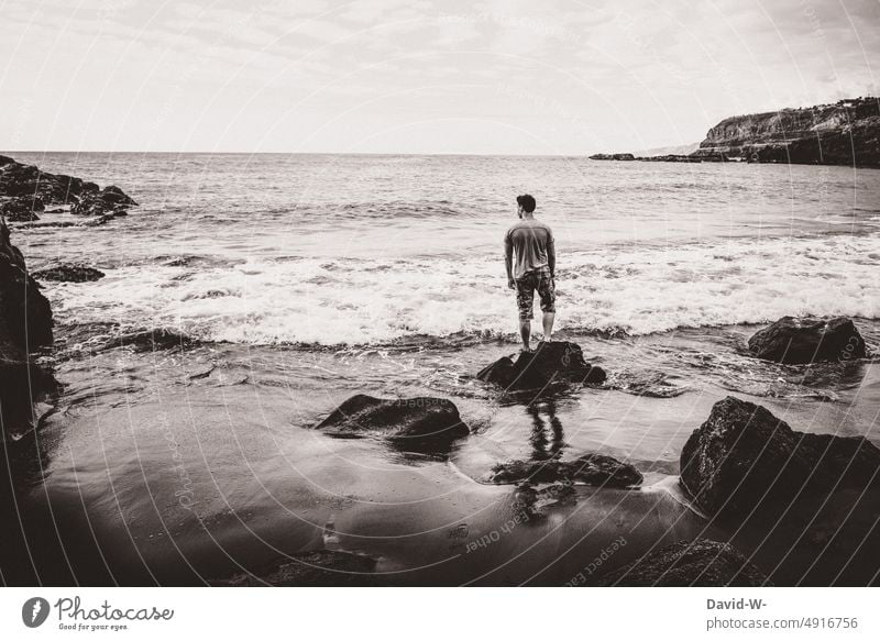 Man looks out to sea Ocean ocean Vantage point tranquillity Observe Waves Memory vacation Beach coast Freedom Far-off places Water