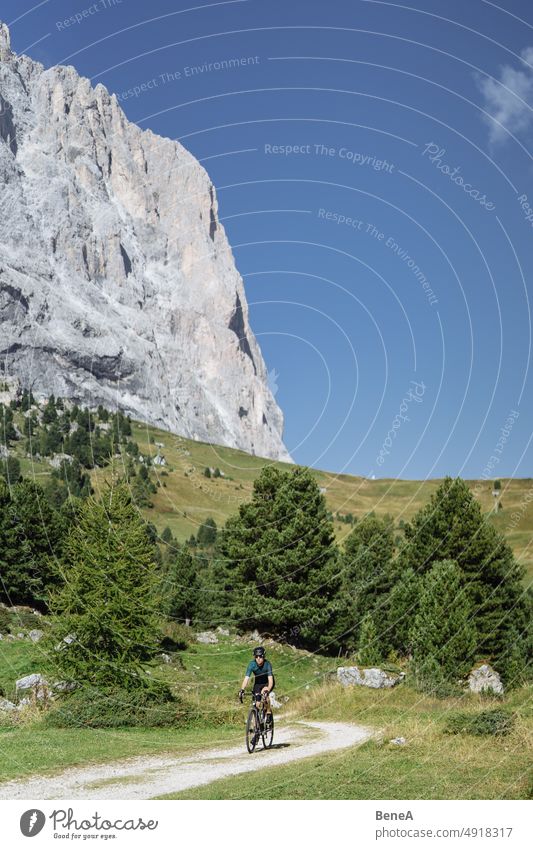 Road cyclist climbing the Italian Dolomites Alpine Alps Alto Adige Athlete Autumn Beautiful Blue Blue Sky Climbing Cycling Cyclist Enjoyment Exercising Fitness