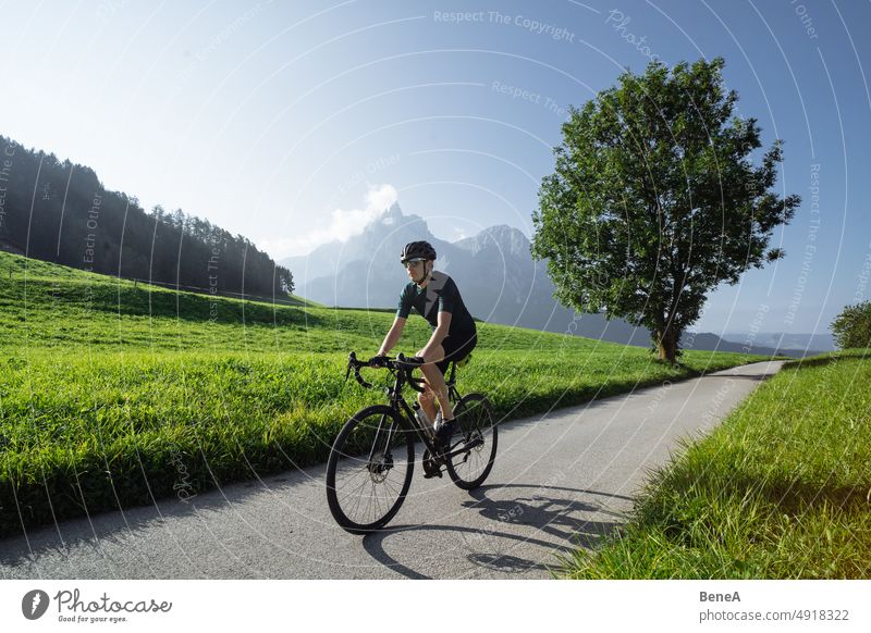 Road cyclist climbing the Italian Dolomites Alpine Alps Alto Adige Athlete Autumn Beautiful Blue Blue Sky Climbing Cycling Cyclist Enjoyment Exercising Fitness