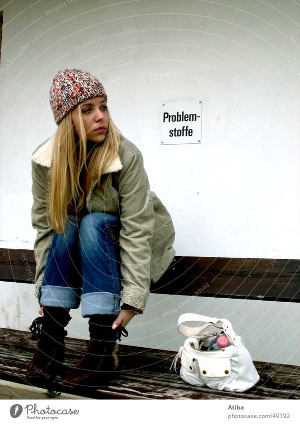 Problem substance: woman Girl Woman Blonde Cold Autumn Jacket Bag Cloth jean Bench Wait Sit