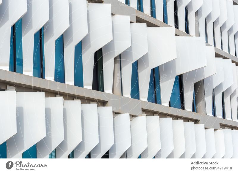 Facade of modern building on street facade exterior urban design architecture decor style contemporary construction wall fragment light infrastructure city town