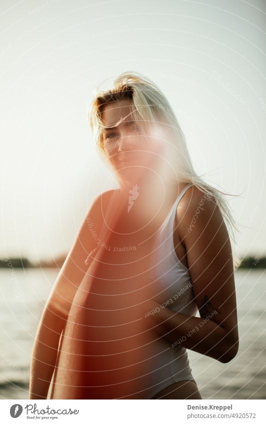 Woman with surfboard Face of a woman Woman's leg Girl power Idyll relaxed tranquillity relaxation Relaxation Summer free time holidays Joy Lifestyle pose Happy