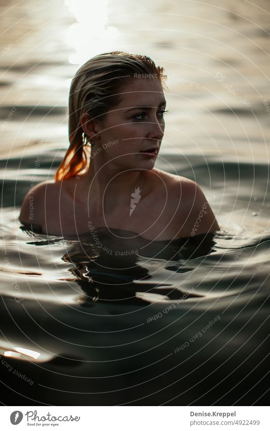 Woman at sea Face of a woman Woman's leg Girl power Idyll relaxed tranquillity relaxation Relaxation Summer free time holidays Joy Lifestyle pose Happy time-out