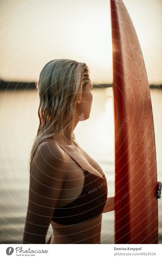 Woman with surfboard Face of a woman Woman's leg Girl power Idyll relaxed tranquillity relaxation Relaxation Summer free time holidays Joy Lifestyle pose Happy