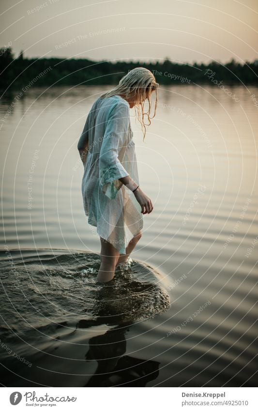 Woman at sea Girl power Idyll relaxed tranquillity relaxation Relaxation Summer free time holidays Joy Lifestyle pose fortunate untroubled optimistic cheerful