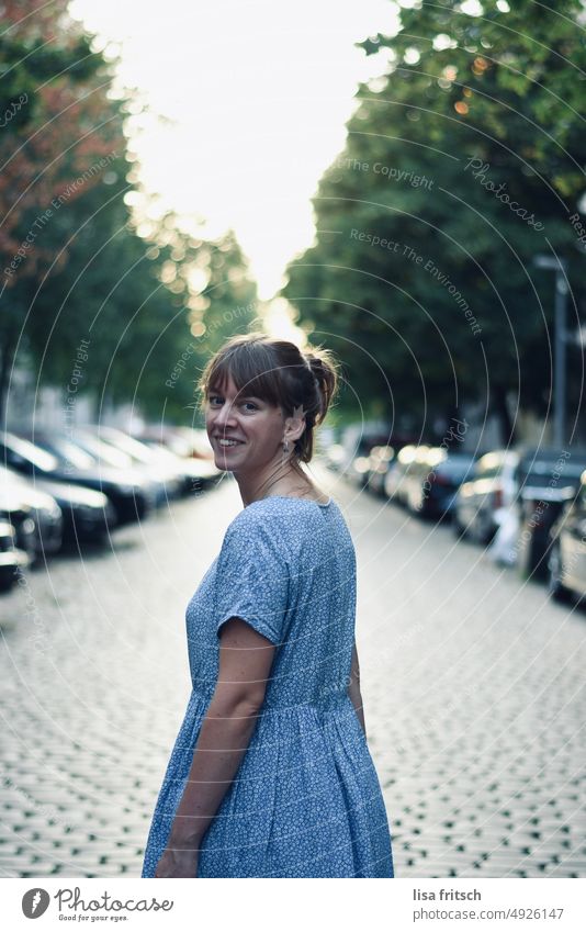 SweetHeart Woman Young woman Blonde Braids Bangs Adults Colour photo Looking into the camera Dress Summer Exterior shot Congenial pretty Street Smiling Day