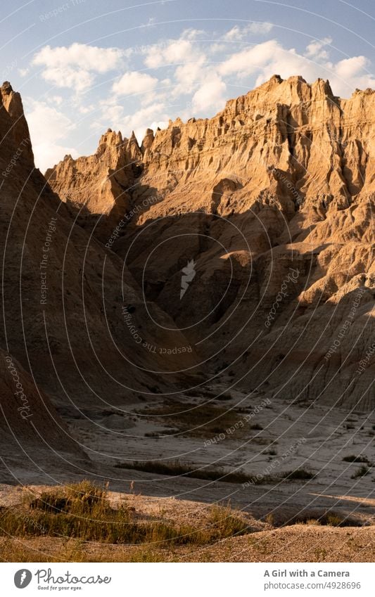 Canyon in Badlands National Park USA taken from below Wasteland National Park South Dakota Contrast Light Shadow Hot Slot Narrow Warmth Mountain Day Landscape