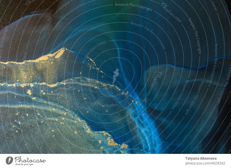 Abstract alcohol ink background abstract liquid flow wave fluid paint artistic splash texture wallpaper gold creative marble green black blue color effect