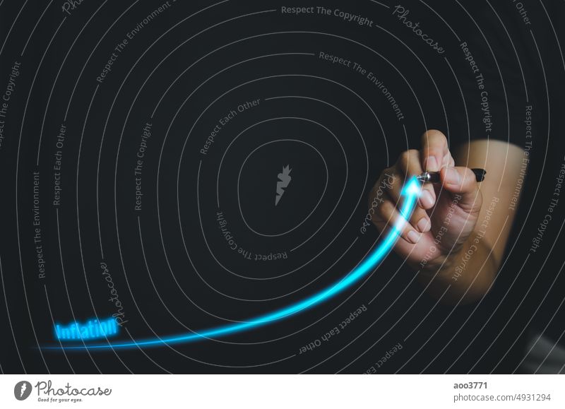 Man holding hand pen virtual screen arrow inflation copy space background.Business economy growth investment finance saving money. business chart graph market