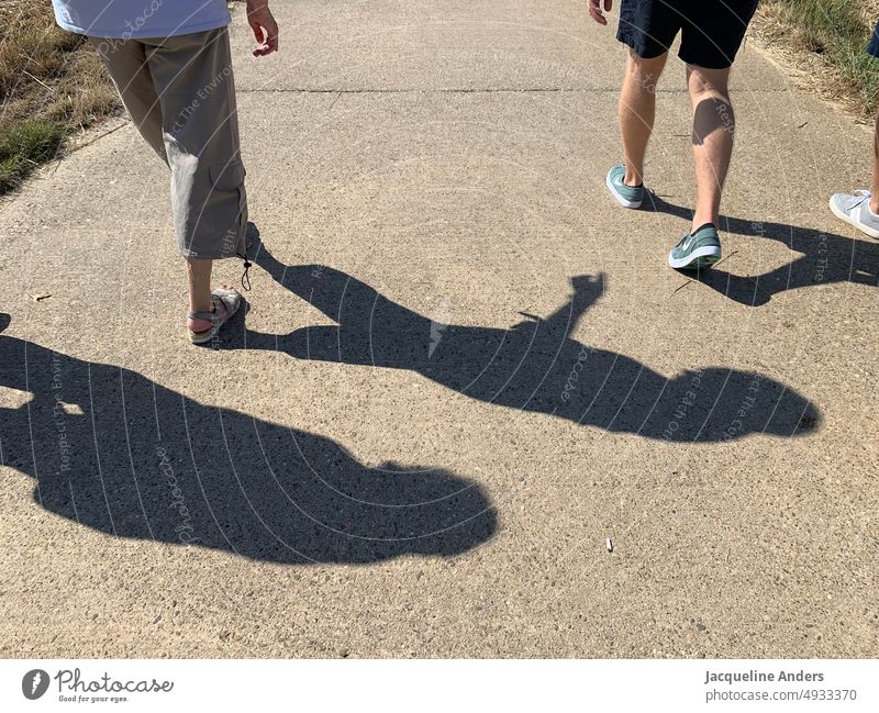 Stroller in the sun with shade go for a walk strollers Shadow Shadow play Sun Lunchtime Afternoon Exterior shot To go for a walk Going Lanes & trails