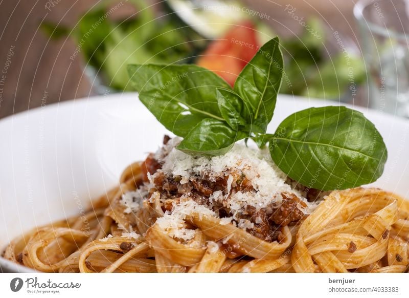 Tagliatelli pasta with bolognaise sauce on wood Tagliatelle Bolognaise sauce background Eating Parmesan Delicious salubriously tribunal Close-up traditionally