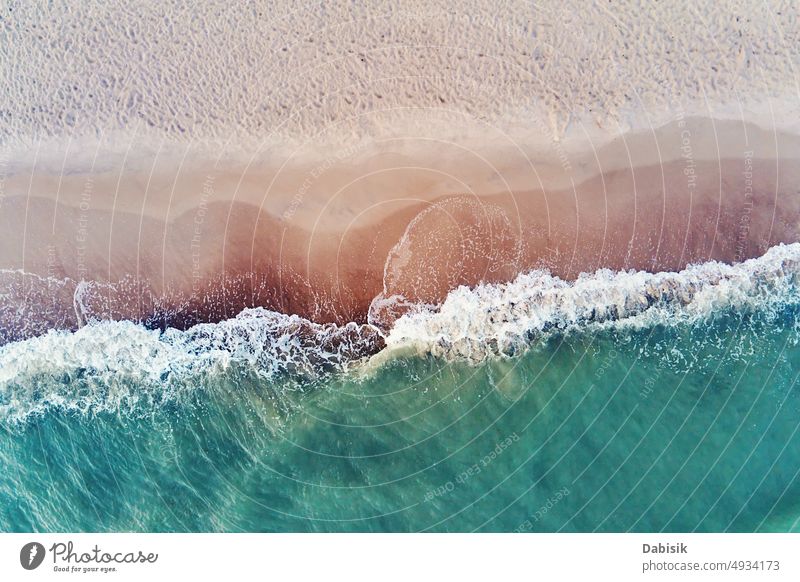 Coastline with blue sea waves and sand beach, top view ocean aerial water background above shore summer tropical sandy nature travel landscape vacation coast