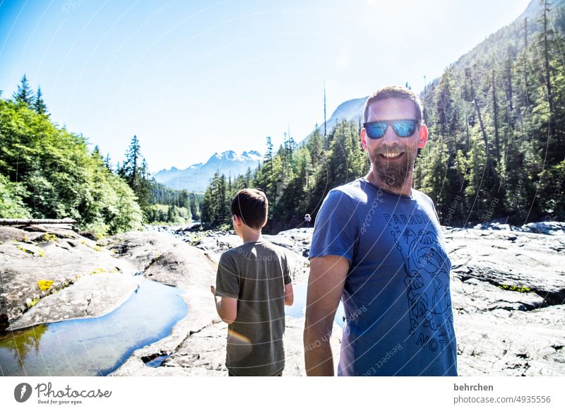 back to back Cool Cool (slang) Riverbed Rock Rock formation Colour photo Freedom Sky trees Landscape Nature Far-off places Vancouver Island British Columbia