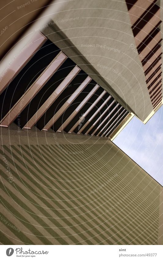 strip block Stripe House (Residential Structure) Tower block Ghetto Balcony Housefront Anonymous Block Sky Clouds Green Brown Concrete Feeble Boredom