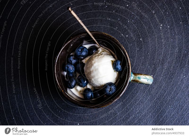 Summer dessert with ice cream and berries background berry blueberry scoop bowl copy space cup dark eat food fruit gelato homemade meal organic stone summer