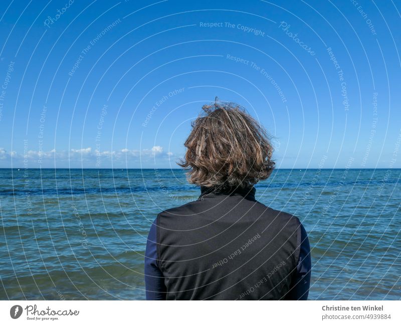 Enjoy the wide view over the sea Woman Rear view Ocean Blue Baltic Sea coast Island fair weather clouds Clouds Clouds on the horizon Moody atmospheric