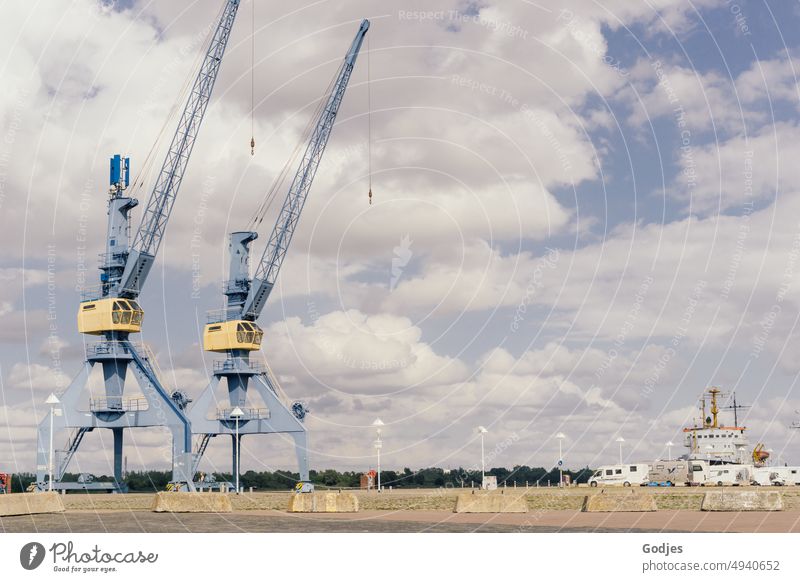 Cranes and caravans in the port area Dockside crane Harbour Rostock Exterior shot Navigation Sky Colour photo Economy Deserted Town Logistics Port City Industry