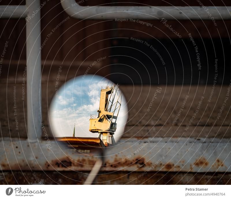 The crane opposite, reflection Crane Mirror exterior mirrors Rear view mirror Industry Sky Blue Clouds Warehouse Brown Exterior shot rail Reflection Deserted