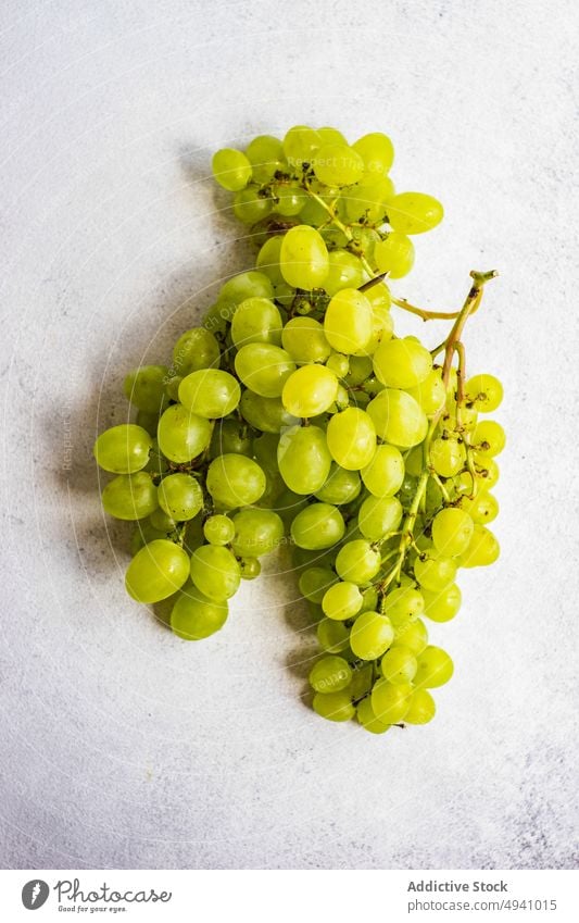 Fresh ripe green grape concrete dessert diet eat food fresh fruit healthy juicy meal organic sweet tasty bowl stoneware vitamin delicious juice natural colorful