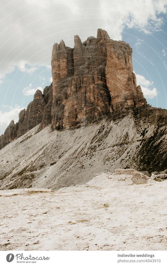 Tre cime di lavaredo in the Alps in Europe. Rock stone landscape in the mountains. Nobody on the image. rocky scenery, blue sky, clouds in the sky. alps