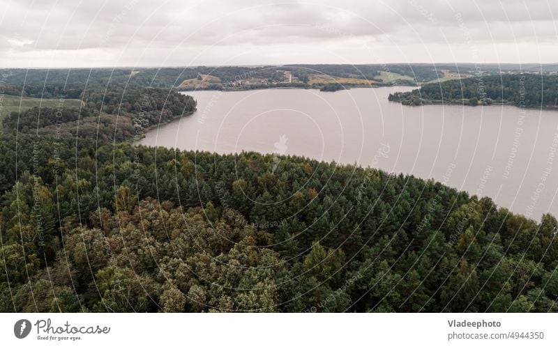 Aerial view of green summer forest and roads, blue lake. Rural landscape. nature water aerial travel above natural tree rural country outdoor countryside