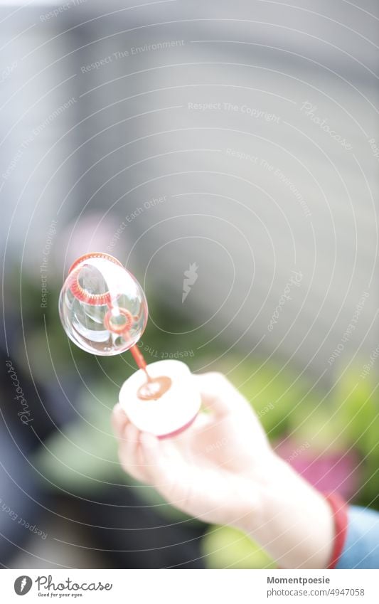 soap bubble Soap bubble Hand Colour photo Human being Playing Blow Reflection Multicoloured Joy Bubble Transparent Dream Glittering Infancy Bursting Ease