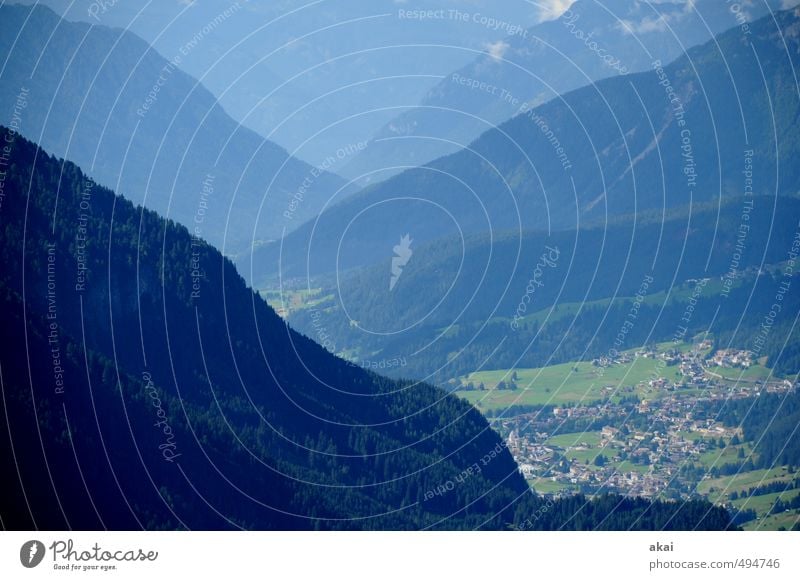 In Trento, Italy mountains Valley Village Landscape Fassa Valley Teleperspective Telephoto lens Mountain Clouds Vacation & Travel Tourism Exterior shot