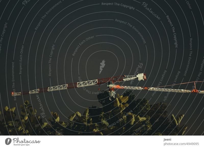 Construction cranes in the night sky Construction site Crane Sky Workplace Construction machinery Build Tall Machinery Economy Craft (trade) Large Illuminated