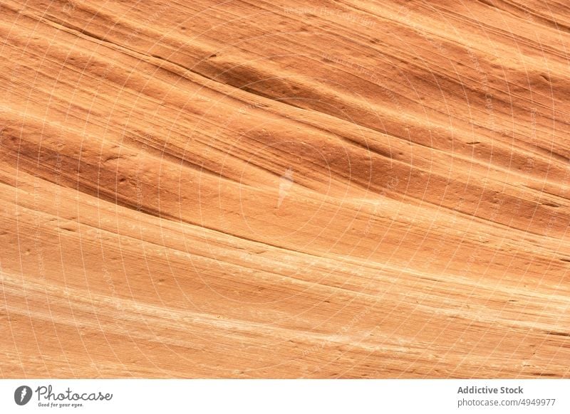 Sandstone wall of canyon cliff sandstone surface uneven texture background little wild horse canyon utah usa united states america daytime formation natural