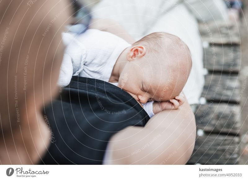 Mother breastfeeding and hugging her baby boy outdoors Baby Appease Feeding Lactation Nutrients Nursing mama Chest Lick Feeling of togetherness Milk Parents