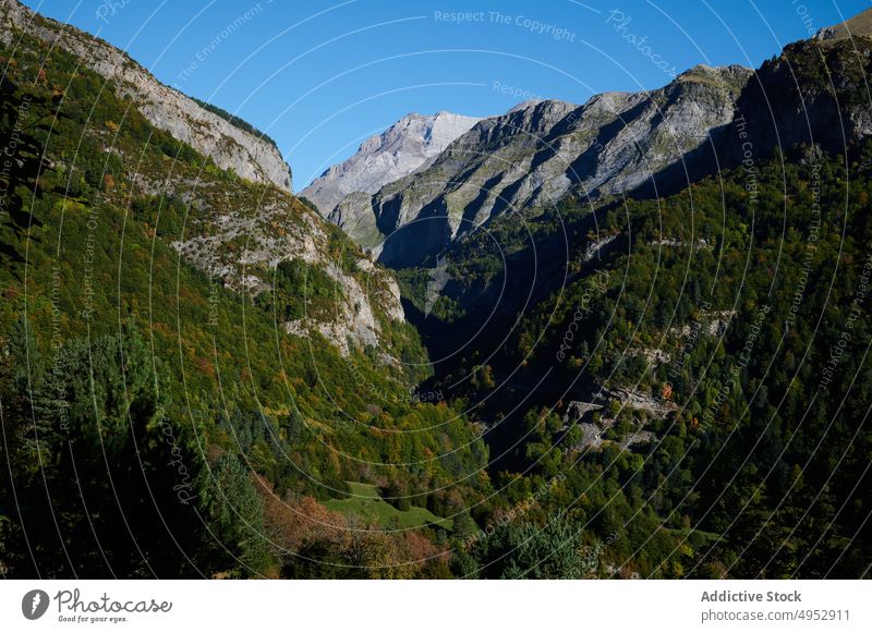 Rocky mountains in sunny nature rock pyrenees ridge stone slope range rocky rough scenic landscape environment destination high blue sky sunlight climate