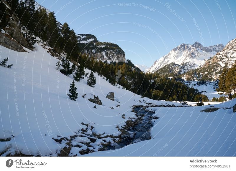 River in snowy rocky mountains in highland brook frozen winter cold nature formation river flow stream scenery season rough ice freeze creek environment