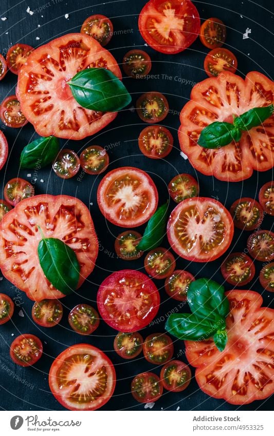 Half cut tomatoes on table vegetable ripe food fresh ingredient organic healthy diet juicy natural raw vegetarian slice delicious freshness cooking sliced