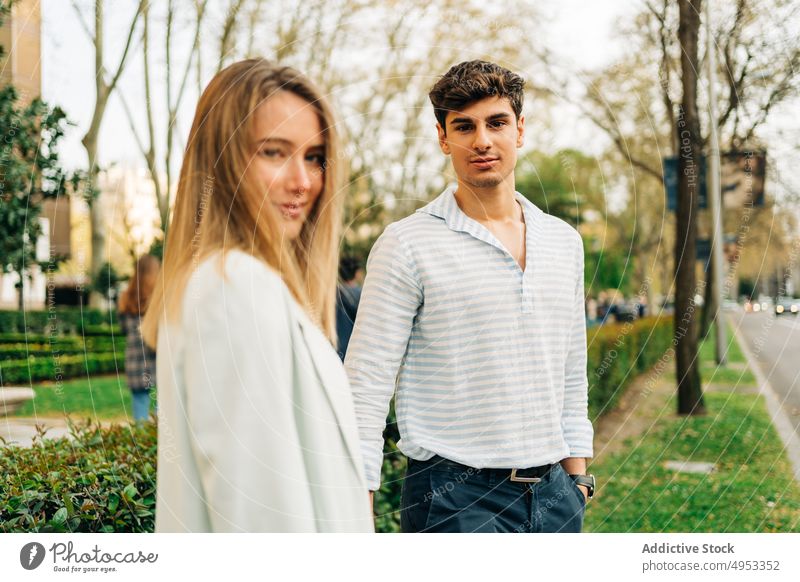 Stylish couple embracing in park in city hug embrace love garden tender relationship romantic cuddle together affection gentle bonding in love date amorous