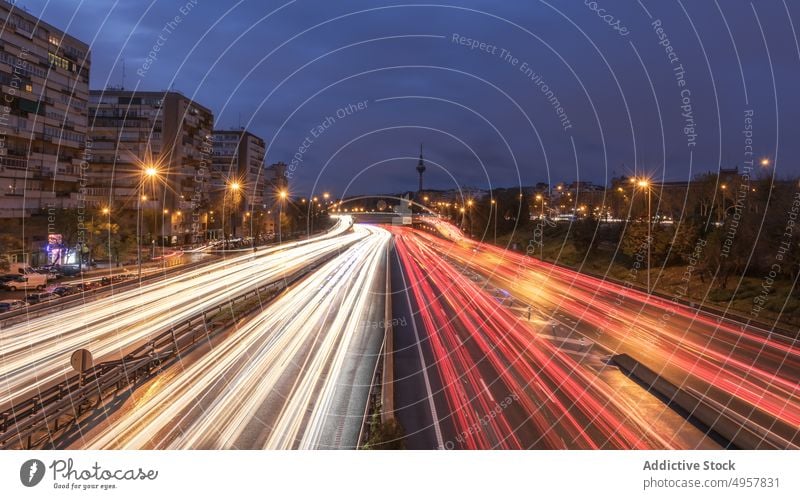 Traffic lights in night city traffic trail road roadway line red white madrid spain evening speed cityscape illuminate fast highway nightlife dark asphalt