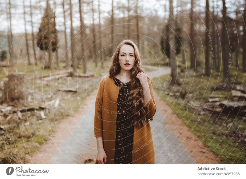 Young hipster woman in the countryside girl nature young person lifestyle summer model beauty hair outdoors casual fashion background caucasian natural face