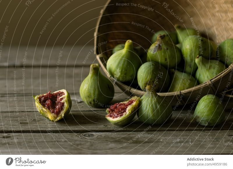 Fresh delicious figs in closeup red green organic food raw juicy vitamin seed pile ingredient diet fresh sweet health fruit ripe vibrant tropical exotic vegan