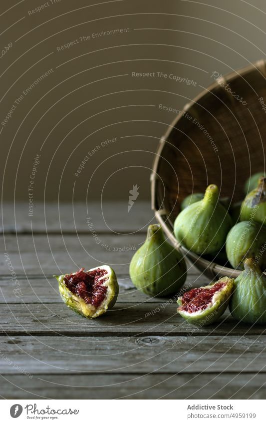 Fresh delicious figs in closeup red green organic food raw juicy vitamin seed pile ingredient diet fresh sweet health fruit ripe vibrant tropical exotic vegan