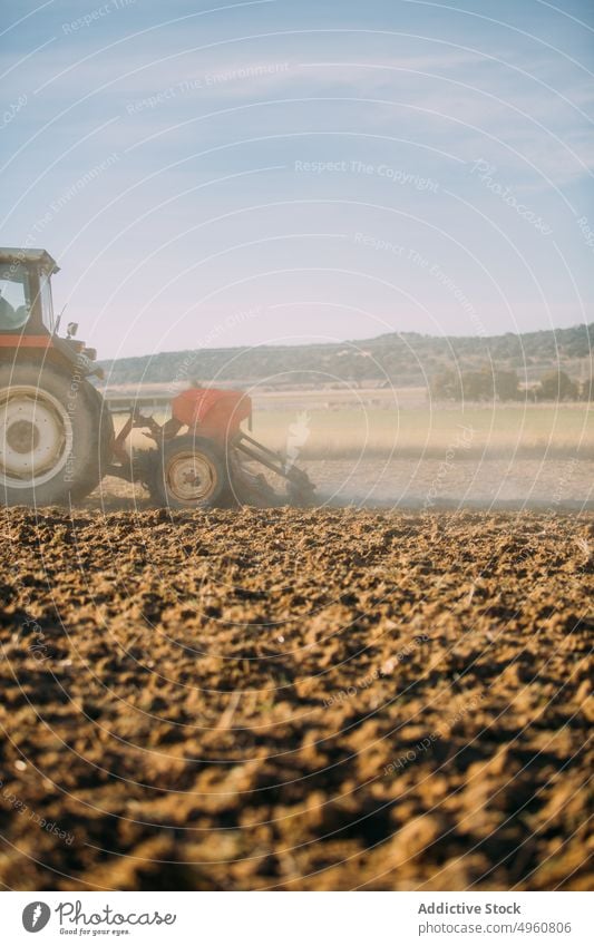 Old tractor working on the field agriculture agro countryside cultivation farm harvest land machine outdoor plant plow rural rustic rye sky sunny Tractor