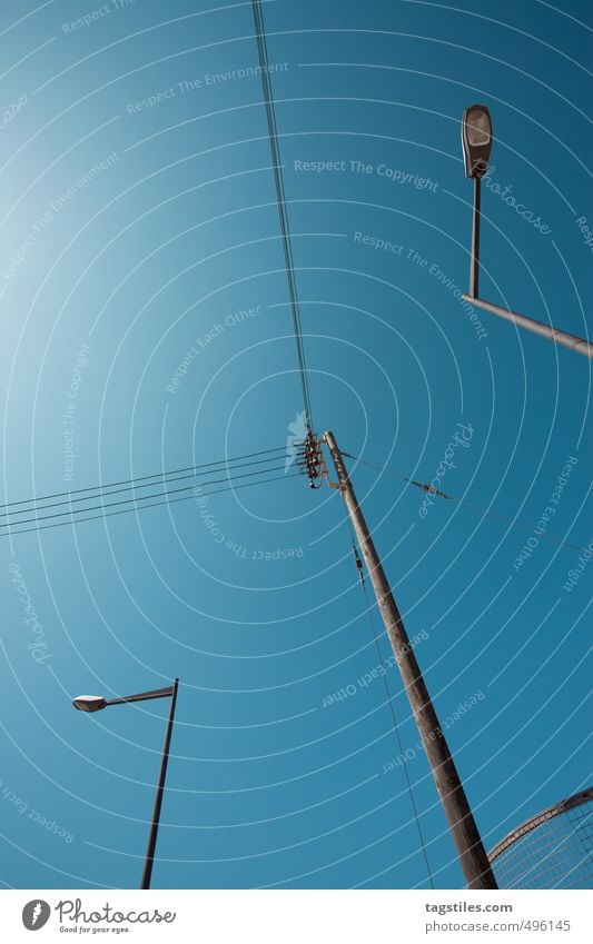 STREET LINES Lantern Street lighting Ciudadella Menorca Spain Abstract Wide angle Electricity pylon Blue Sky Heaven Town street scene Balearic Islands Parallel