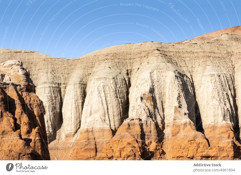 Sandstone cliffs on sunny day sandstone formation nature landscape summer mountain breathtaking highland rough goblin valley state park utah usa america