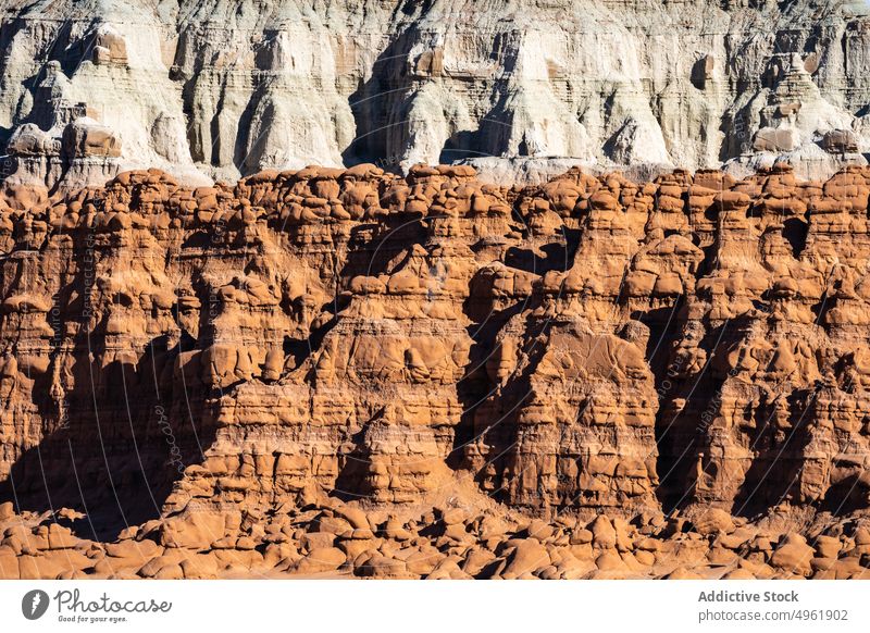 Sandstone cliffs on sunny day sandstone formation nature landscape summer mountain breathtaking highland rough goblin valley state park utah usa america