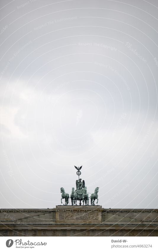 Brandenburg Gate in Berlin and a lot of sky Capital city Monument Germany Landmark Tourist Attraction Manmade structures Tourism Pariser Platz Historic Sky