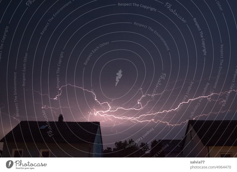 branched lightning over the settlement, the storm front approaches Thunder and lightning lightning bolt Storm Lightning Threat Sky Dangerous Dark Exterior shot