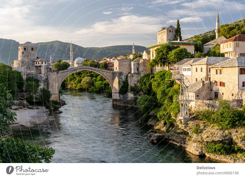 View of Mostar bridge, Bosnia and Herzegovina, daytime mostar bosnia herzegovina europe landmark jump water river old ancient tourist tourism travel famous