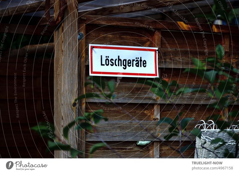 Extinguishers sign on garden shed, to calm excited neighbors who are scared by the occasional bonfire there Clue Safety Signage Fire hazard Forest fire