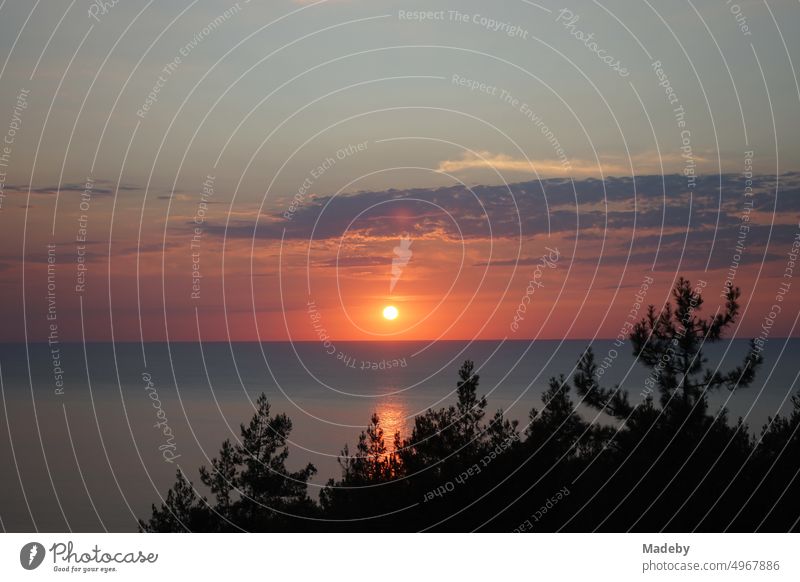 Romantic sunset with lush vegetation and clouds over Black Sea in Inkumu, Bartin province, Turkey Meditation relaxation Twilight tawdry Surface of water