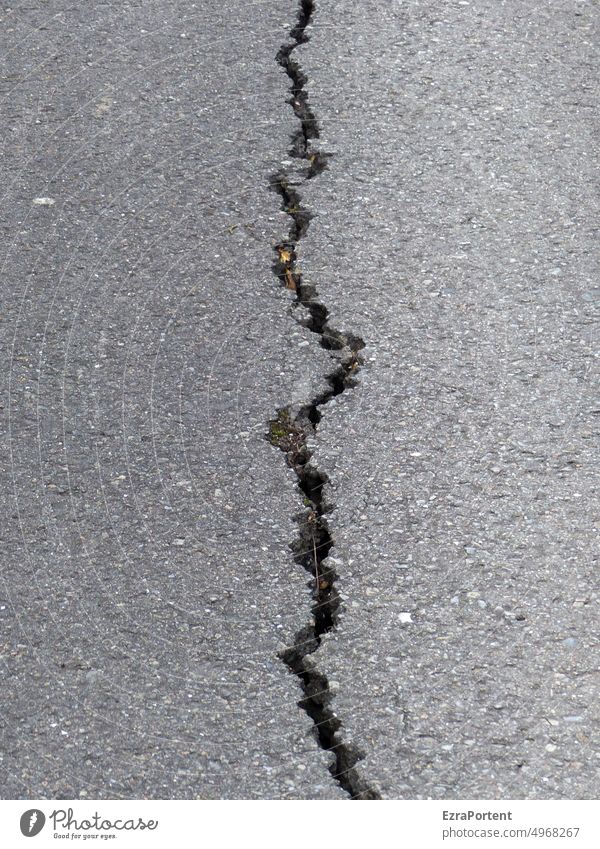 elevation Crack & Rip & Tear Asphalt Street Broken Traffic infrastructure Gray Division Damage Pavement street from above Column ripped